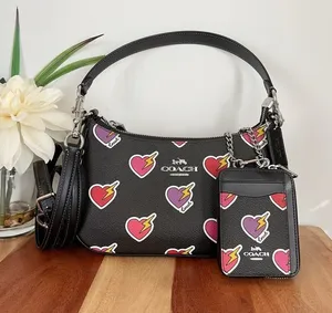 NWT Coach Teri‎ Shoulder Bag and Zip Card Case With Heart Bolt Print thumbnail 1