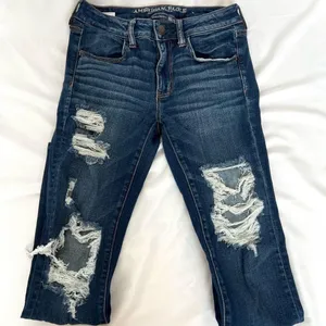 American Eagle Women's Distressed Dark Blue Skinny Jeans thumbnail 1