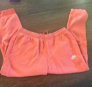 Women’s Coral Pink Nike Sweatpants thumbnail 1
