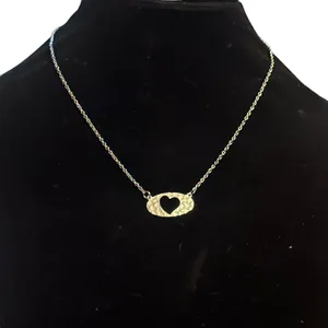 Vintage silver tone cut out hammered heart necklace thumbnail 1