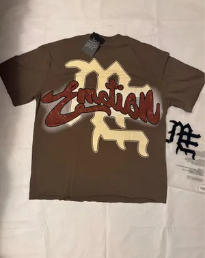 Brown Emotion graphic tee with blindfolded angel with wings and the word 'Emotion' in a red glittery script, Size M thumbnail 3