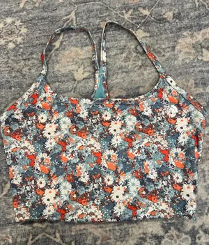 The North Face Women's Floral Racerback sports bra in Blue and Orange size M. thumbnail 1