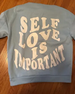 Women’s Light Blue Sweatshirt with "Self Love Is Important" Print thumbnail 1