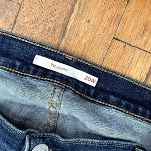 Levi's 711 skinny jeans cotton pants denim medium wash distressed pockets blue thumbnail 3