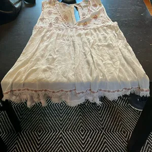 Free People crème tank top with dusty pink embroidery. GUC. thumbnail 1