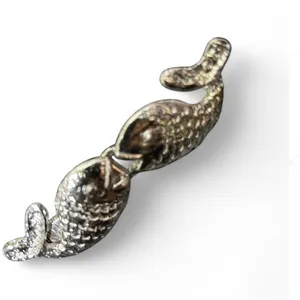 silver-tone belt with two fish heads that connect at the center. thumbnail 8