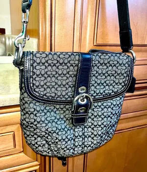 COACH monogram crossbody bag. Black and grey thumbnail 1