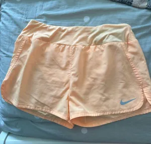 Bright orange Nike Dri-fit running shorts M thumbnail 1