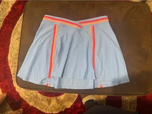 blue tennis skirt with orange and pink thumbnail 2