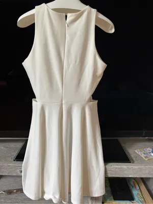 Sleeveless White Mini Dress with Side Cutouts thumbnail 9