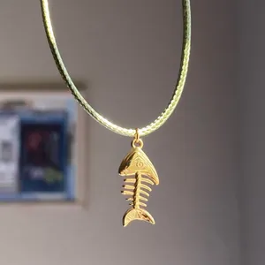 Handmade gold tone stainless steel fish bone boho funky simple necklace🌀🐟🧡 thumbnail 1