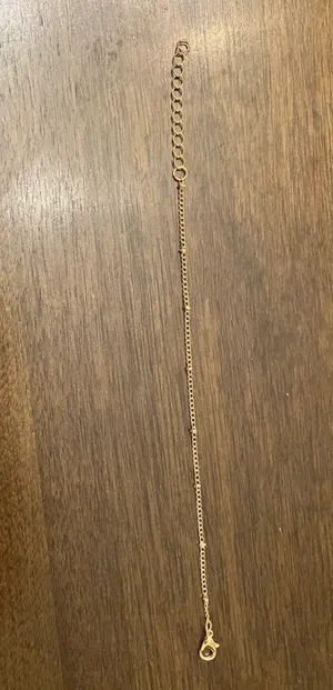 Delicate Satellite Gold Chain Bracelet with Knot Accents thumbnail 3
