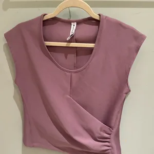 Athleta mauve sleeveless top EUC thumbnail 1