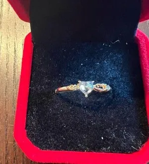 Dainty White Gold Diamond Ring with Accent Stones thumbnail 1