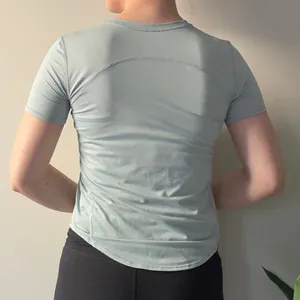 Lululemon Athletic pale green short sleeve tee top t-shirt stretch crew neck EUC thumbnail 2