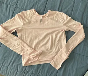 SKIMS baby pink cropped long sleeve tshirt thumbnail 1
