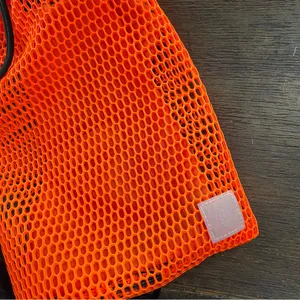 Free People Movement Mini Mesh Sling Bag in Orange thumbnail 4