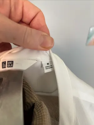 Uniqlo White Sleeveless Button-Up Blouse thumbnail 9