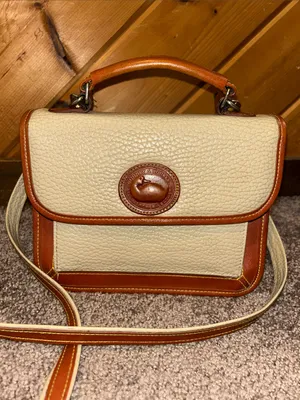 Vintage Dooney & Bourke cream and tan pebbled leather crossbody handbag thumbnail 2