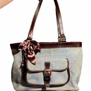 Dooney & Bourke East West Canvas / Leather Trim Donegal Crest Tote Shoulder Bag thumbnail 11