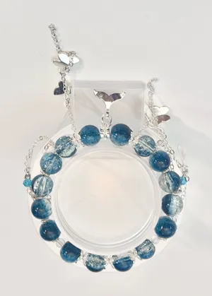 Hand Crafted Blue Beaded Charm Bracelet with Whale Tail And Butterfly Accents thumbnail 1