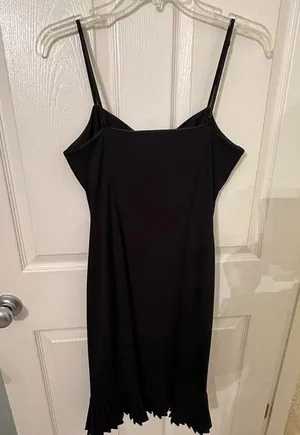 Black dress with ruffles at the bottom. thumbnail 1
