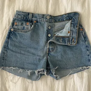 Levi's Blue Jean Shorts with Frayed Hem and Distressed Look Vintage thumbnail 4