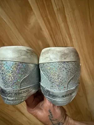 GOLDEN GOOSE Super-Star Iridescent and Glitter Leather Sneakers - Sz 38 - US 7 1/2 These are in good condition with light wear throughout. They are a pretty hard to find but super cute style. They have like holographic leather and glitter areas. Please see pics for details. Metallic leather upper Round toe Lace-up closure White leather star Cushioned insole; unlined Rubber sole Made in Italy thumbnail 11