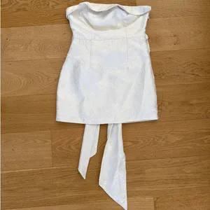 Lulu’s - Destiny Floral Jacquard Strapless Mini Dress Back Bow Detail in White thumbnail 1