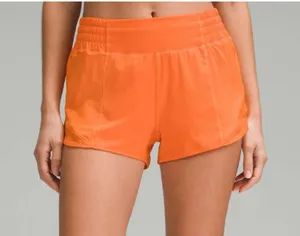 Lululemon Hotty Hot High-Rise Lined Short 2.5" Orange Flash 12 thumbnail 1