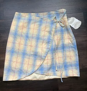 NWT Altar'd State Pastel Blue and yellow Plaid Wrap Mini Skirt thumbnail 1