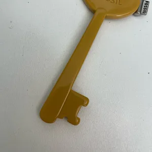 Vintage Fossil Keyper Key Charm Purse Hang Tag Fob Mustard Yellow Silver thumbnail 4