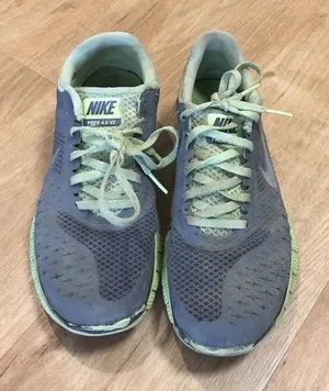 Neon green Nike running shoes thumbnail 1