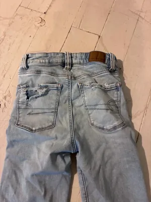 American Eagle Super High-Rise Light-Wash Flare Jeans thumbnail 7