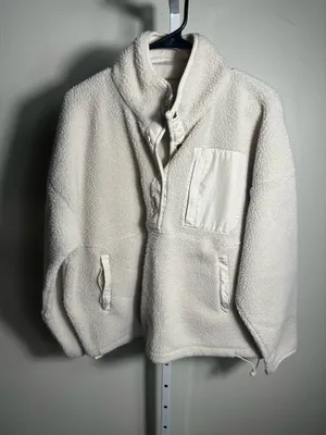 S107. WILO The Label, size Small, an ivory/cream cozy sherpa fleece pullover with snap placket, chest pocket, zip hand pockets, and adjustable hem. thumbnail 1