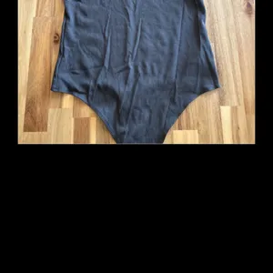 American Eagle Black Ribbed Short Sleeve Bodysuit Women’s Size Large thumbnail 4