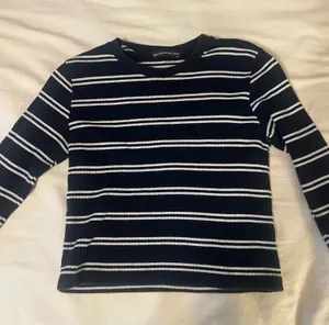 Brandy Melville Navy and White Striped Long Sleeve thumbnail 1