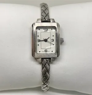 Vintage silver tone women’s watch 18mm quartz white dial 6.5”-7” running thumbnail 1