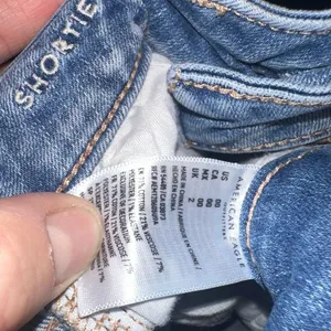 American Eagle lace pocket distressed 00 shortie jeans shorts thumbnail 4