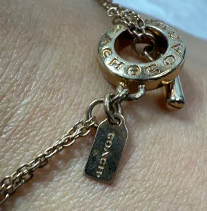 Coach Gold Toned Open Circle Double Strand Toggle Bracelet thumbnail 5