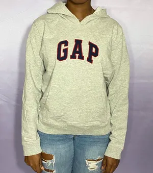Gap heather grey hoodie Tagged women’s Large L fits a bit smaller classic logo at the front chest area in scarlet red and navy blue. It has a nice kangaroo pouch at the front Measurements: Length: 22” Bust: 44” Waist: 40” Hip: 38” Sleeve: 28” thumbnail 3