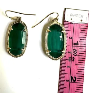 Kendra Scott Dani earrings in gold and emerald cat's eye thumbnail 6