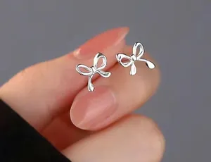 Boutique Silver Bow Stud Earrings thumbnail 1