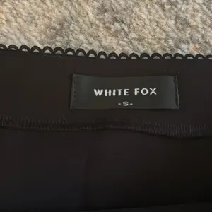 White Fox Black Skirt thumbnail 2