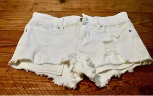 Bullhead Denim Co. White Distressed Low Rise Denim Shorts, Size 22 thumbnail 1