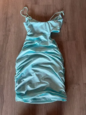 Like New Light Blue Cutout Ruched Mini Dress - Size XS Turn heads in this stunning light blue mini dress, perfect for your next night out, vacation, or special event. Features: Condition: Like new, excellent pre-owned condition. Design: Flattering ruched detailing, chic front cutout, and elegant twist-front bodice with thin straps. Fabric: Ultra-comfortable and stretchy blend of 95% Polyester and 5% Elastane that hugs your curves beautifully. Size: Women's XS. Fast shipping. Feel free to reach out with any questions or offers! thumbnail 2