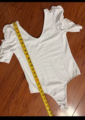 Vylette White bodysuit with Puffy Sleeves - Size Medium. ***refer to measurements. Super Cute top gentle worn and in excellent condition. Cotton/ spandex material. Measurements approximately for the bodysuit/ 14” from armpit to armpit x 25” from shoulder to snaps in crotch. Non-smoking home. Priced to sell at as is condition. Don’t like my price please make reasonable offer. thumbnail 7
