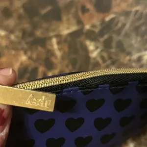 Ipsy indigo make up bag with black heart print thumbnail 2