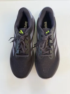 adidas women’s Black Athletic Shoes with White Stripes and Neon Green Accent thumbnail 2