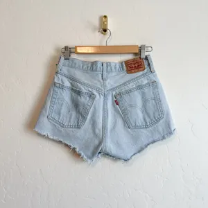 Levi's | 501 Original 100%‎ Cotton Cut Off Raw Hem Jean Shorts in Medium Blue thumbnail 3